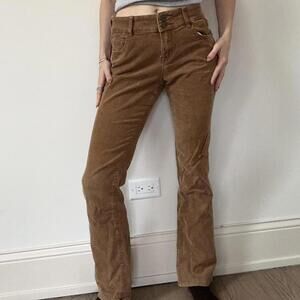vintage 70s cinnamon flare corduroys with adorable button details!